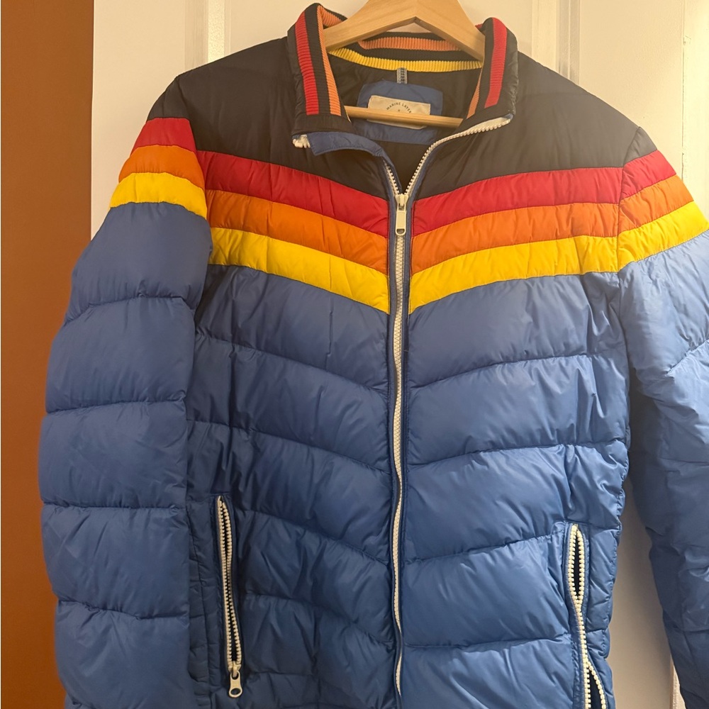 Marine Layer Blue Puffer Jacket with Red, Orange & Yellow Chevron
